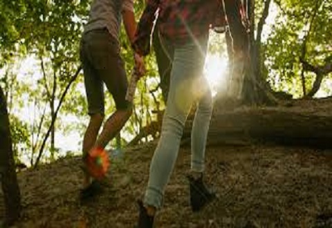 healthy people hiking in woods